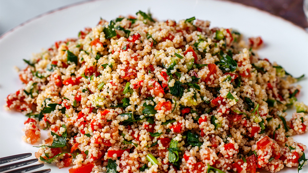 front-view-colorful-salad-containing-sliced-vegetables-inside-white-plate-brown-floor_1000px Quinoa and Black Bean Salad