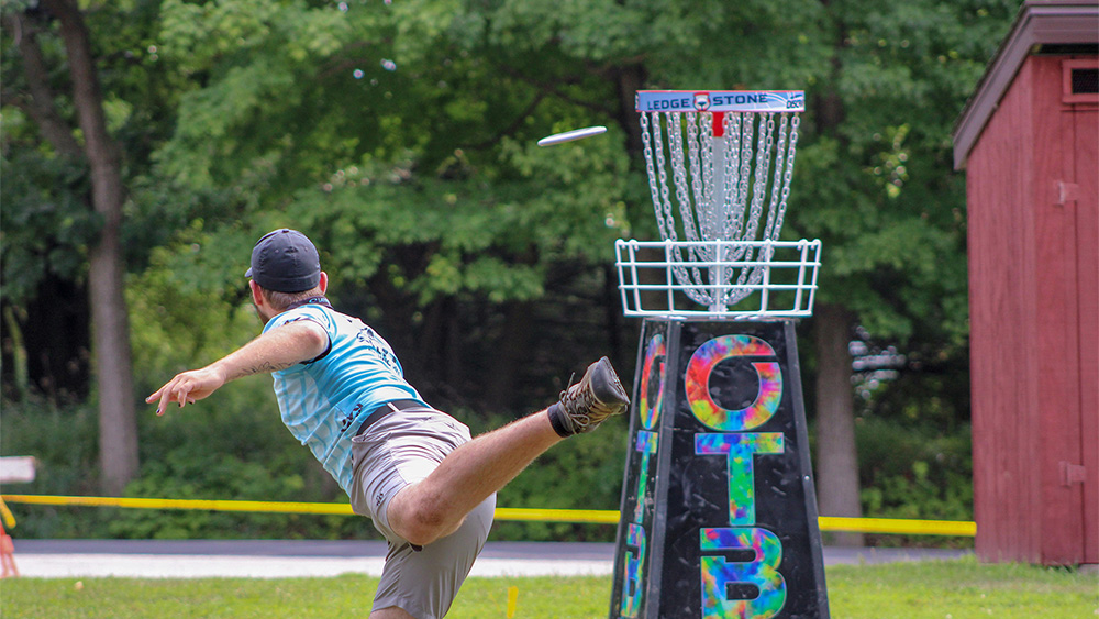 Man throwing disc golf