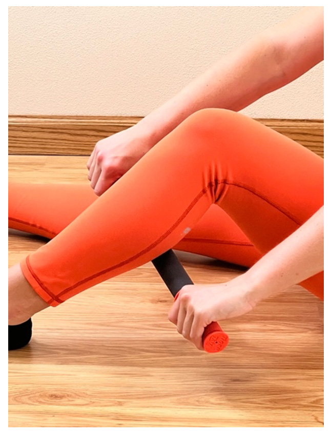 Roll the calf muscle using the Tiger Tail 18” Roller