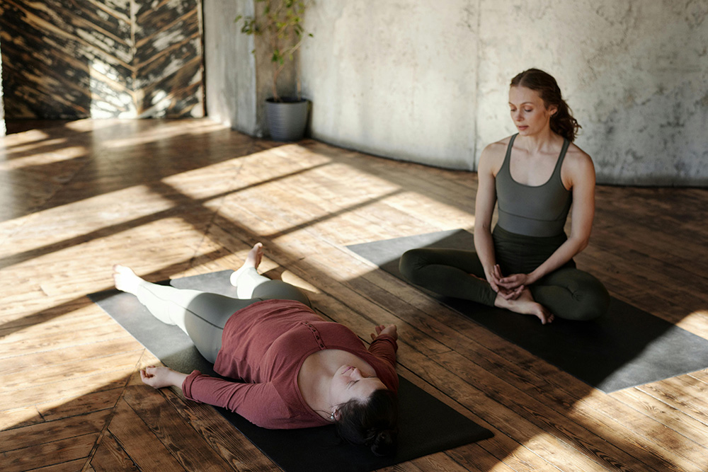 Woman practicing Yoga and Meditation for Mental Health-Focused Fitness