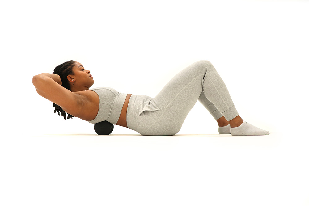 Roll Lower Back Pain With the Tiger Ball 4.4 Peanut Roller