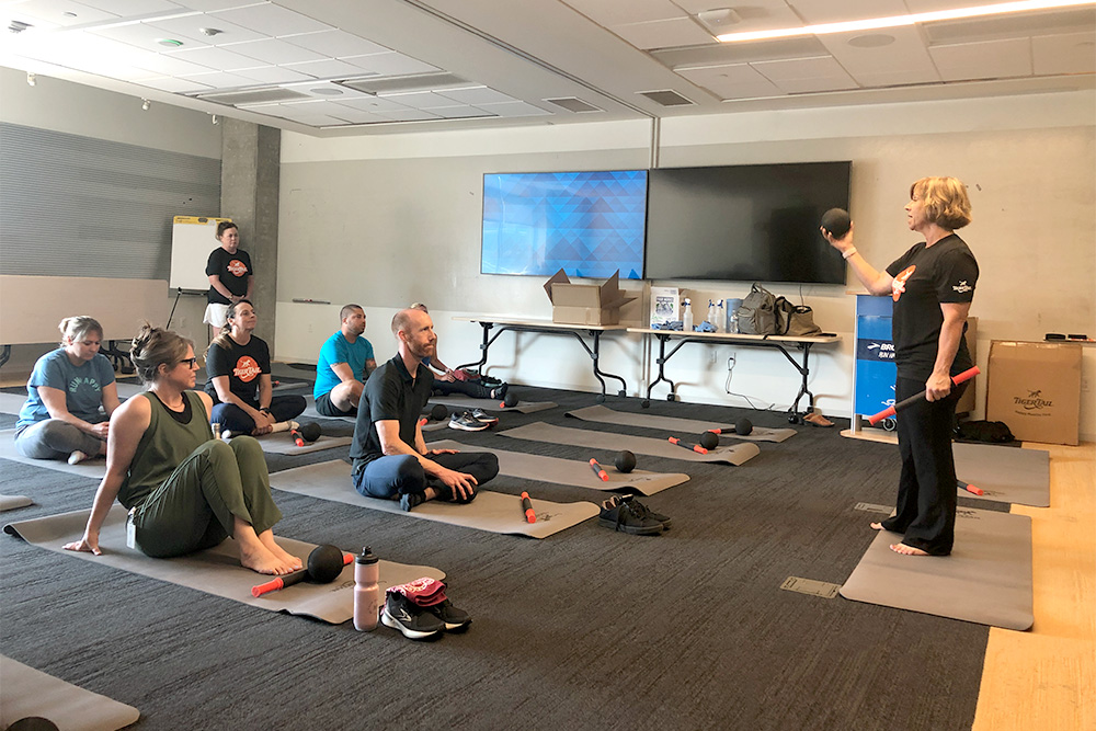 The Happy Muscles 365 corporate program emphasizes short daily recovery habits, while the Stretch & Flex Method centers on structured stretching and flexibility work that can be added to safety meetings or pre-shift routines.