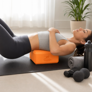 Person using a foam roller peanut to relieve knots in lower back muscles